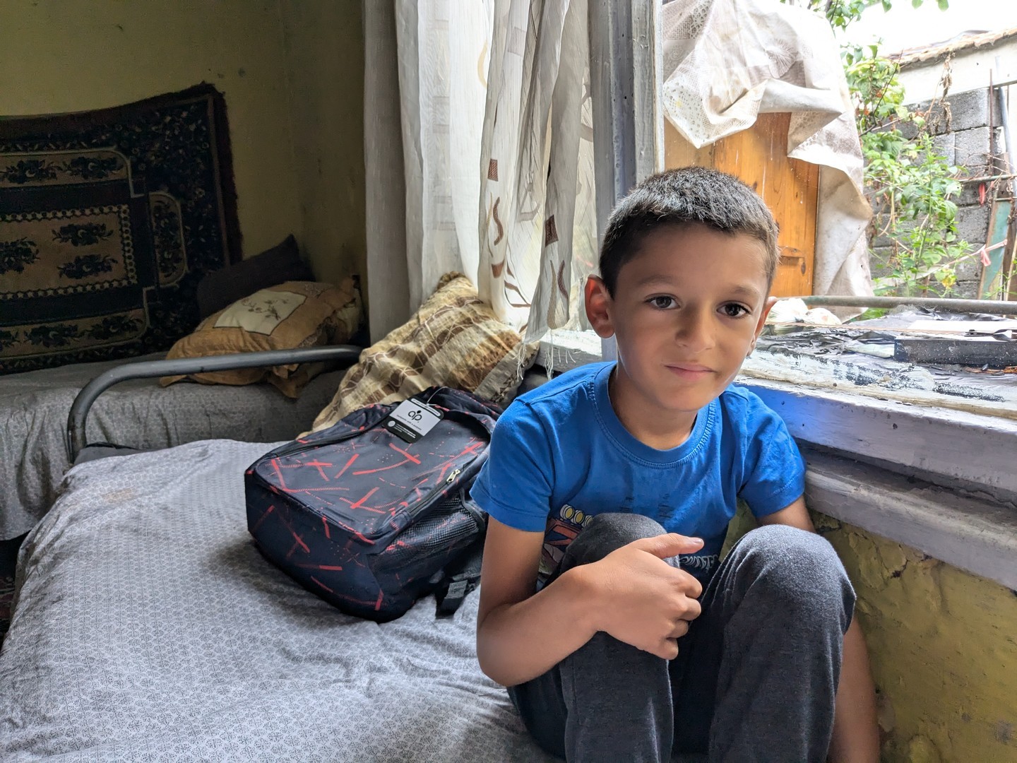 Samuil with his new backpack
