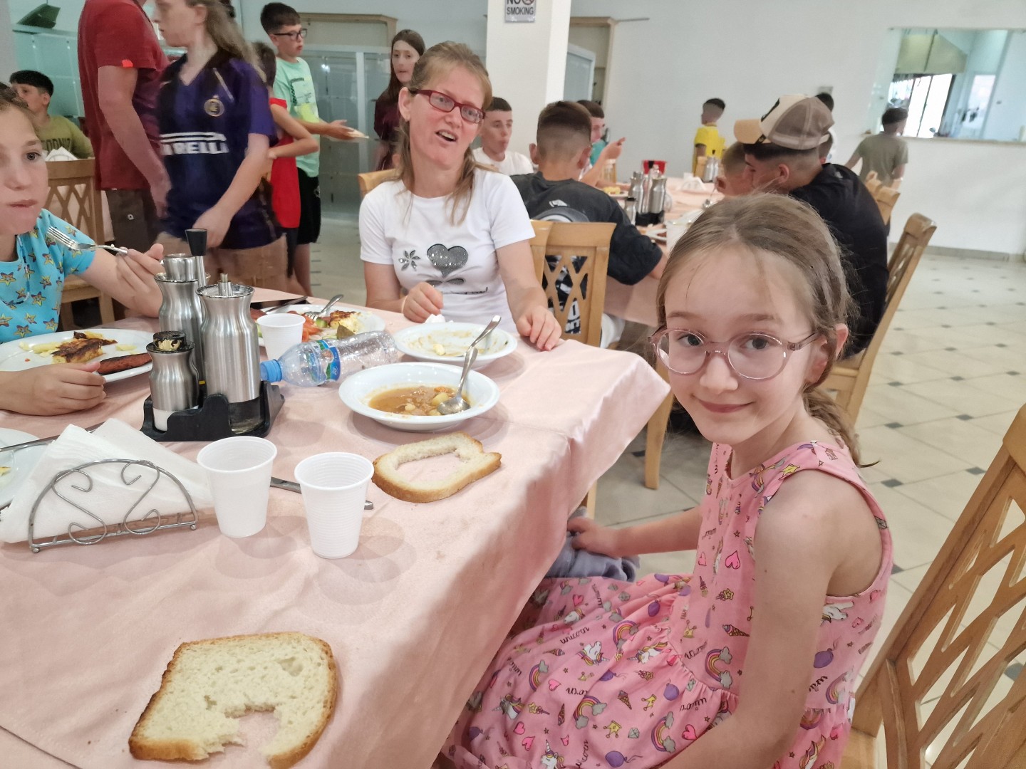 Arlina eating lunch at camp